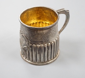 A George IV demi-fluted silver christening mug, with later engraved inscription, London, 1823, 69mm.